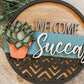 Welcome Succas Door Hanger